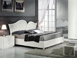 Letto con testiera lavorata che gioca con le forme King di Euro Design